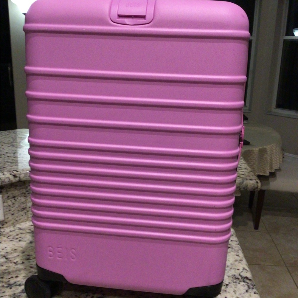 BEIS Berry carry on roller bag.